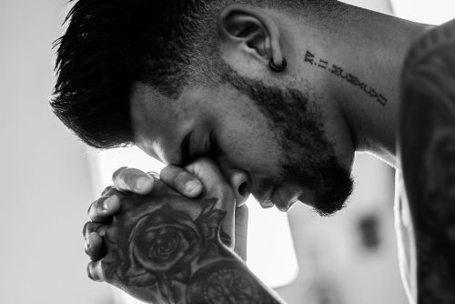 Praying Hands Tattoo Meaning: The Dürer Drawing, Designs and Placement