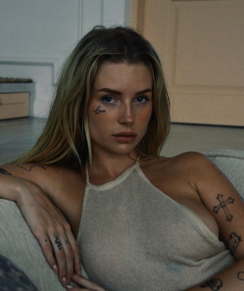 Lottie Moss flashes her nipple in daring top as she posts cryptic message