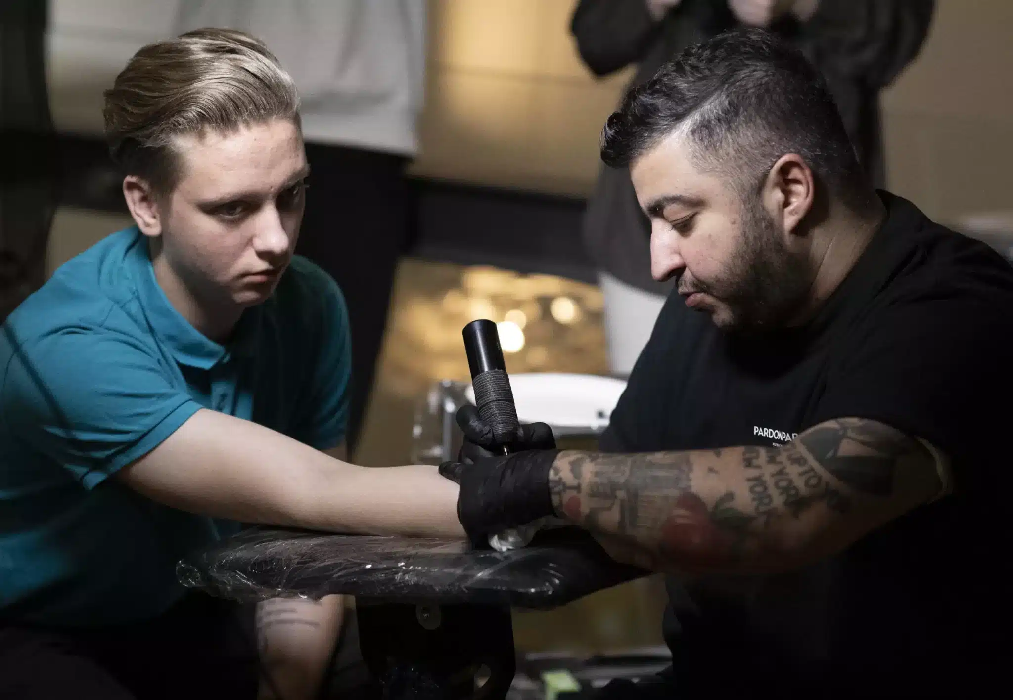 Catholics line up for free tattoos in Austria scaled